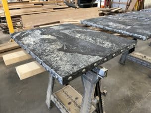 patina zinc table top - dark uniform finish with pewter buttons