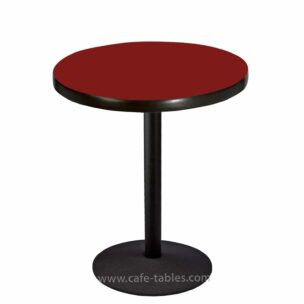 custom round port laminate table top with black disk base at dining height