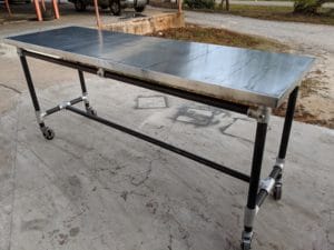 custom pipe frame table base with casters at bar height