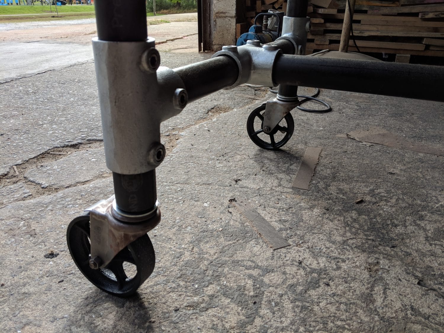 custom rolling pipe base with vintage casters