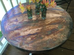 aged round copper table top